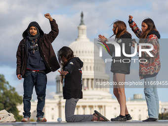 Indigenous demonstrators stand atop a horse trailer near the U.S. Capitol in Washington, D.C. on October 15, 2024 after U.S. Park Police att...