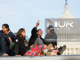 Indigenous demonstrators sit atop a horse trailer near the U.S. Capitol in Washington, D.C. on October 15, 2024 after U.S. Park Police attem...