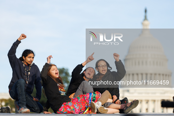 Indigenous demonstrators sit atop a horse trailer near the U.S. Capitol in Washington, D.C. on October 15, 2024 after U.S. Park Police attem...