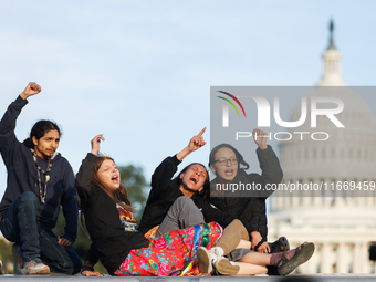 Indigenous demonstrators sit atop a horse trailer near the U.S. Capitol in Washington, D.C. on October 15, 2024 after U.S. Park Police attem...