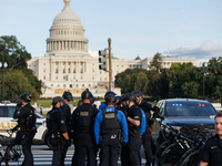 U.S. Capitol Police speak with each other after clashes with Indigenous demonstrators near the U.S. Capitol in Washington, D.C. on October 1...