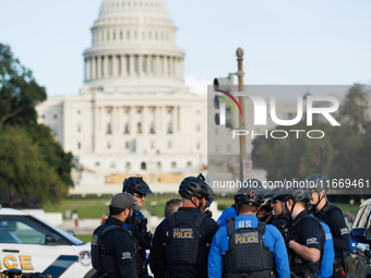 U.S. Capitol Police speak with each other after clashes with Indigenous demonstrators near the U.S. Capitol in Washington, D.C. on October 1...