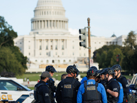 U.S. Capitol Police speak with each other after clashes with Indigenous demonstrators near the U.S. Capitol in Washington, D.C. on October 1...