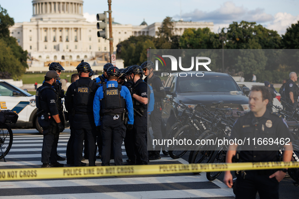 U.S. Capitol Police speak with each other after clashes with Indigenous demonstrators near the U.S. Capitol in Washington, D.C. on October 1...