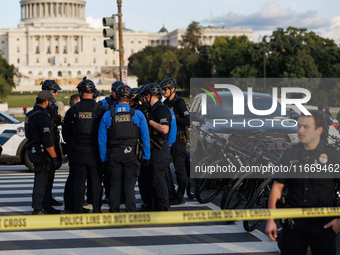 U.S. Capitol Police speak with each other after clashes with Indigenous demonstrators near the U.S. Capitol in Washington, D.C. on October 1...