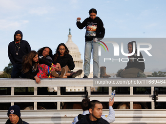 Indigenous demonstrators stand atop a horse trailer near the U.S. Capitol in Washington, D.C. on October 15, 2024 after U.S. Park Police att...