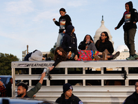 Indigenous demonstrators stand atop a horse trailer near the U.S. Capitol in Washington, D.C. on October 15, 2024 after U.S. Park Police att...