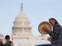 An Indigenous demonstrator plays a drum near the U.S. Capitol in Washington, D.C. on October 15, 2024. after U.S. Park Police attempted to c...