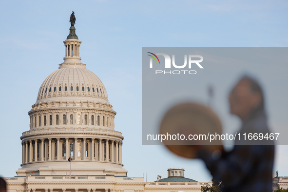 An Indigenous demonstrator plays a drum near the U.S. Capitol in Washington, D.C. on October 15, 2024. after U.S. Park Police attempted to c...