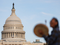 An Indigenous demonstrator plays a drum near the U.S. Capitol in Washington, D.C. on October 15, 2024. after U.S. Park Police attempted to c...