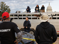 Police surround a horse trailer after Indigenous demonstrators clash with police near the U.S. Capitol in Washington, D.C. on October 15, 20...