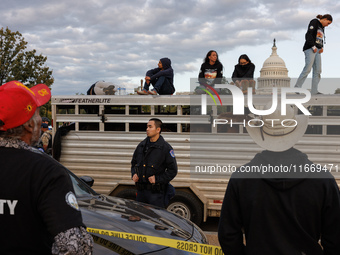 Police surround a horse trailer after Indigenous demonstrators clash with police near the U.S. Capitol in Washington, D.C. on October 15, 20...