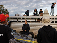 Police surround a horse trailer after Indigenous demonstrators clash with police near the U.S. Capitol in Washington, D.C. on October 15, 20...