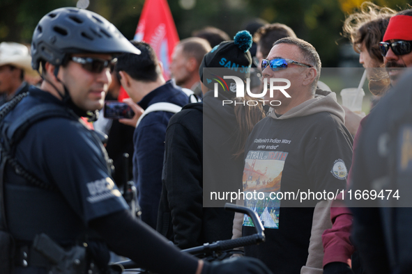 Indigenous demonstrators chant as police surround a horse trailer near the U.S. Capitol in Washington, D.C. on October 15, 2024. U.S. Park P...