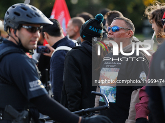 Indigenous demonstrators chant as police surround a horse trailer near the U.S. Capitol in Washington, D.C. on October 15, 2024. U.S. Park P...