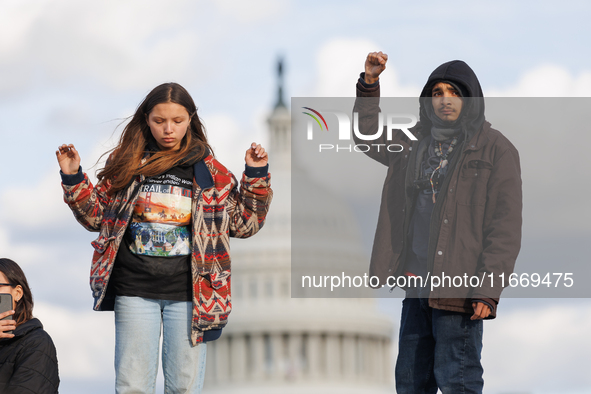 Indigenous demonstrators stand atop a horse trailer near the U.S. Capitol in Washington, D.C. on October 15, 2024 after U.S. Park Police att...