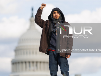 Indigenous demonstrators stand atop a horse trailer near the U.S. Capitol in Washington, D.C. on October 15, 2024 after U.S. Park Police att...