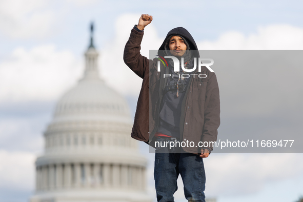 Indigenous demonstrators stand atop a horse trailer near the U.S. Capitol in Washington, D.C. on October 15, 2024 after U.S. Park Police att...