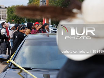 Police surround a horse trailer after Indigenous demonstrators clash with police near the U.S. Capitol in Washington, D.C. on October 15, 20...