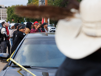 Police surround a horse trailer after Indigenous demonstrators clash with police near the U.S. Capitol in Washington, D.C. on October 15, 20...