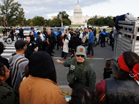 Police surround a horse trailer after Indigenous demonstrators clash with police near the U.S. Capitol in Washington, D.C. on October 15, 20...