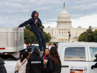 Indigenous demonstrators leave from atop a horse trailer near the U.S. Capitol in Washington, D.C. on October 15, 2024 after a standoff with...