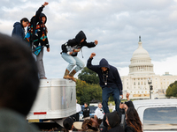 Indigenous demonstrators leave from atop a horse trailer near the U.S. Capitol in Washington, D.C. on October 15, 2024 after a standoff with...