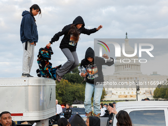 Indigenous demonstrators leave from atop a horse trailer near the U.S. Capitol in Washington, D.C. on October 15, 2024 after a standoff with...