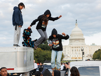 Indigenous demonstrators leave from atop a horse trailer near the U.S. Capitol in Washington, D.C. on October 15, 2024 after a standoff with...