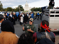 Police surround a horse trailer after Indigenous demonstrators clash with police near the U.S. Capitol in Washington, D.C. on October 15, 20...