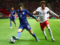 Ivan Perisic of Croatia and Nicola Zalewski of Poland during UEFA Nations League football match Poland - Croatia at National Stadium in Wars...