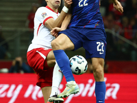 Jan Bednarek of Poland and Igor Metanovic of Croatia during UEFA Nations League football match Poland - Croatia at National Stadium in Warsa...