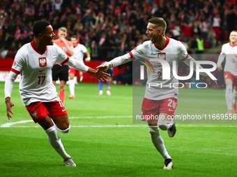 Michael Ameyaw and Sebastian Szymanski of Poland during UEFA Nations League football match Poland - Croatia at National Stadium in Warsaw, P...