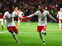 Michael Ameyaw and Sebastian Szymanski of Poland during UEFA Nations League football match Poland - Croatia at National Stadium in Warsaw, P...