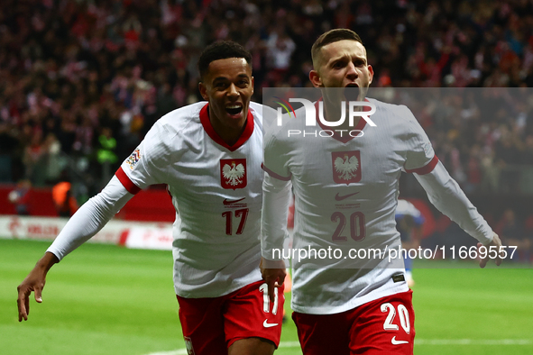 Michael Ameyaw and Sebastian Szymanski of Poland during UEFA Nations League football match Poland - Croatia at National Stadium in Warsaw, P...