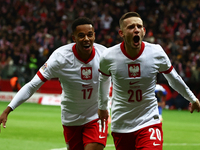 Michael Ameyaw and Sebastian Szymanski of Poland during UEFA Nations League football match Poland - Croatia at National Stadium in Warsaw, P...