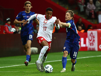 Michael Ameyaw of Poland and Luka Modric of Croatia during UEFA Nations League football match Poland - Croatia at National Stadium in Warsaw...