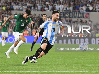 Lionel Messi of Argentina scores his first goal of the night during a match between Argentina and Bolivia at Estadio Mas Monumental Antonio...