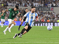 Lionel Messi of Argentina scores his first goal of the night during a match between Argentina and Bolivia at Estadio Mas Monumental Antonio...