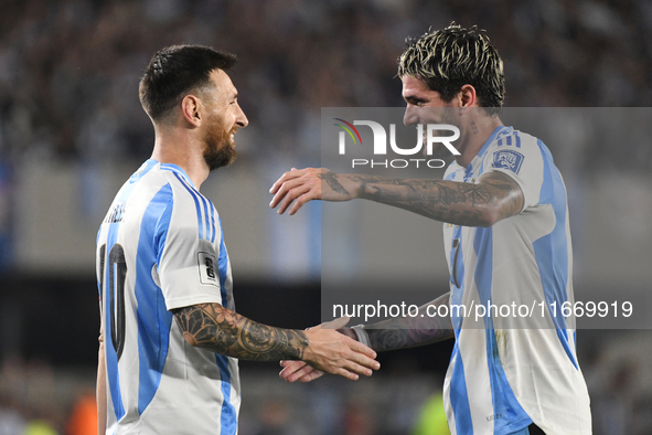 Lionel Messi and Rodrigo de Paul of Argentina celebrate their team's first goal during a match between Argentina and Bolivia at Estadio Mas...