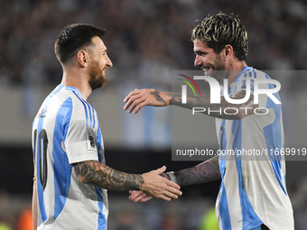 Lionel Messi and Rodrigo de Paul of Argentina celebrate their team's first goal during a match between Argentina and Bolivia at Estadio Mas...