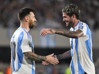 Lionel Messi and Rodrigo de Paul of Argentina celebrate their team's first goal during a match between Argentina and Bolivia at Estadio Mas...