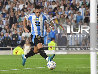 Lautaro Martinez of Argentina scores the second goal for his team during a match between Argentina and Bolivia at Estadio Mas Monumental Ant...