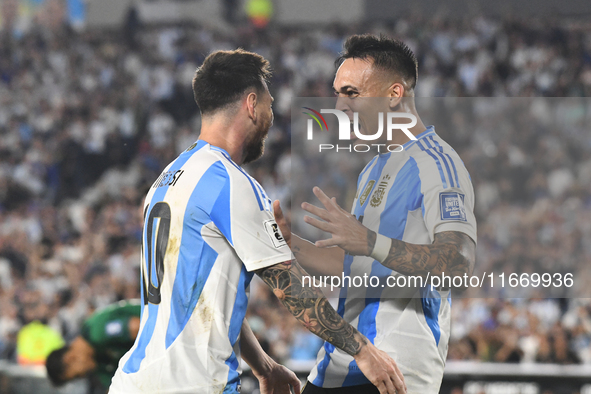 Lionel Messi and Lautaro Martinez celebrate their team's second goal during a match between Argentina and Bolivia at Estadio Mas Monumental...