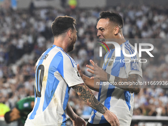 Lionel Messi and Lautaro Martinez celebrate their team's second goal during a match between Argentina and Bolivia at Estadio Mas Monumental...