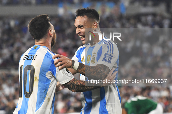 Lionel Messi and Lautaro Martinez celebrate their team's second goal during a match between Argentina and Bolivia at Estadio Mas Monumental...