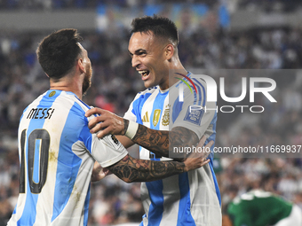 Lionel Messi and Lautaro Martinez celebrate their team's second goal during a match between Argentina and Bolivia at Estadio Mas Monumental...