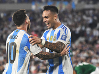 Lionel Messi and Lautaro Martinez celebrate their team's second goal during a match between Argentina and Bolivia at Estadio Mas Monumental...