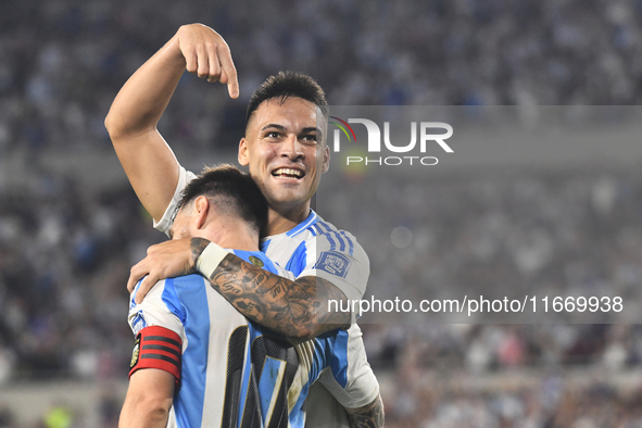 Lionel Messi and Lautaro Martinez celebrate their team's second goal during a match between Argentina and Bolivia at Estadio Mas Monumental...