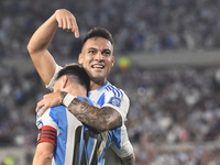 Lionel Messi and Lautaro Martinez celebrate their team's second goal during a match between Argentina and Bolivia at Estadio Mas Monumental...